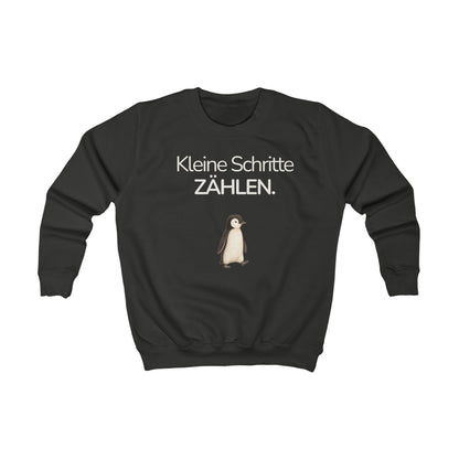 Schwarzes Kinder Sweatshirt mit Pinguin und Spruch Kleine Schritte zählen