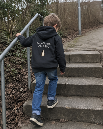 Premium Kinder Kapuzenjacke Pinguin "Kleine Schritte zählen"