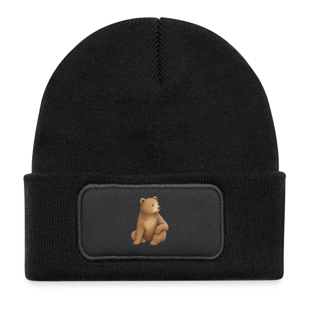 Kinder Beanie mit dem Bär in schwarz.