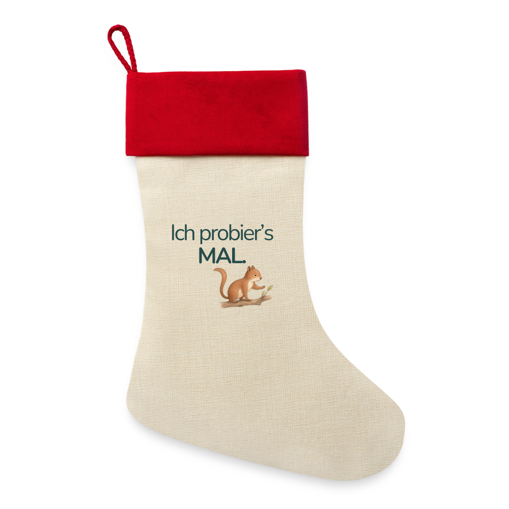 Ein Weihnachsstrumpf mit rotem Saum und der Botschaft "Ich probiers mal" und dem Motiv Eichhörnchen.
